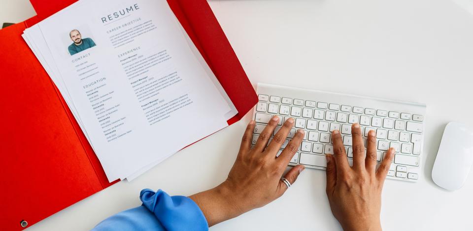 Person working on updating a resume