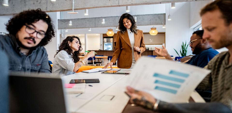 A group of project managers having a meeting in an office.