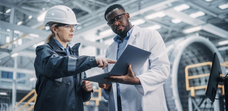 Male and female safety and health workers reexamine their workplace safety plan.