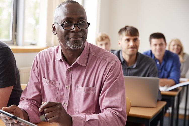 Older adult professional attending a modeling and simulation course