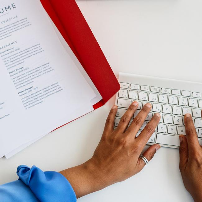 Person working on updating a resume