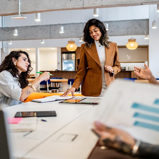 A group of project managers having a meeting in an office.